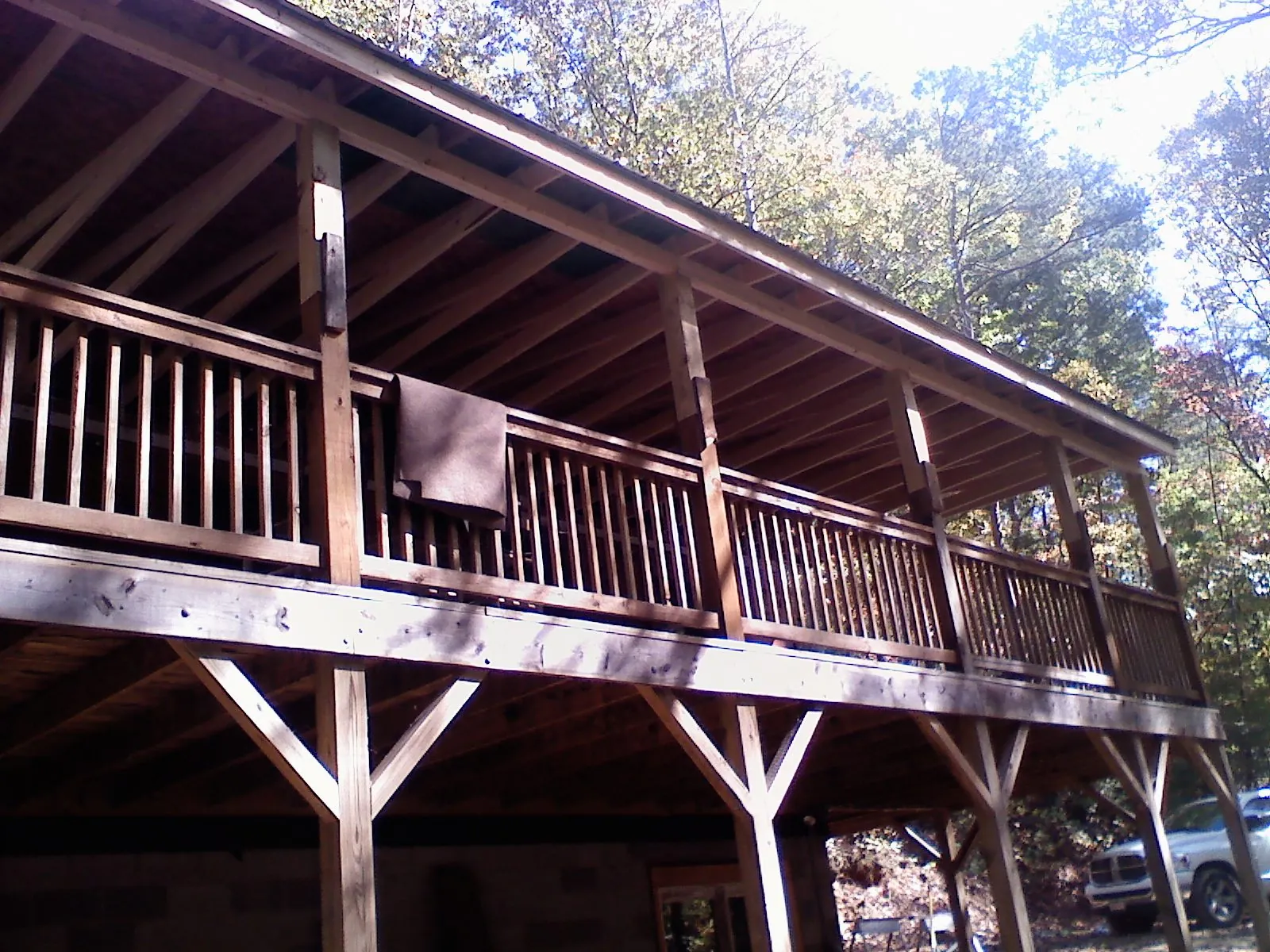 Timber framing under a new elevated porch and deck — Roof Leak Repair in Vaughn by Roofing Brothers